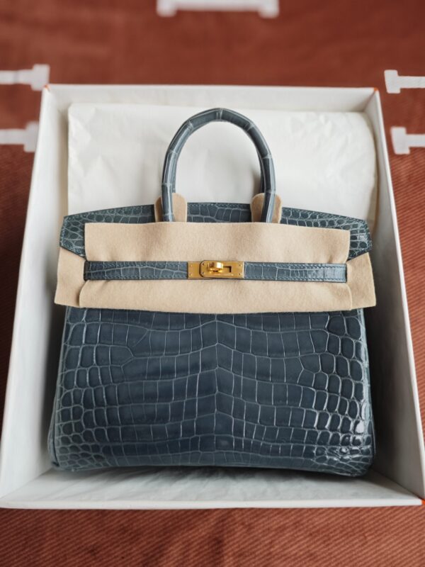 Hermès Birkin 25 Bleu de Nuit Shiny Porosus Crocodile with Gold Hardware